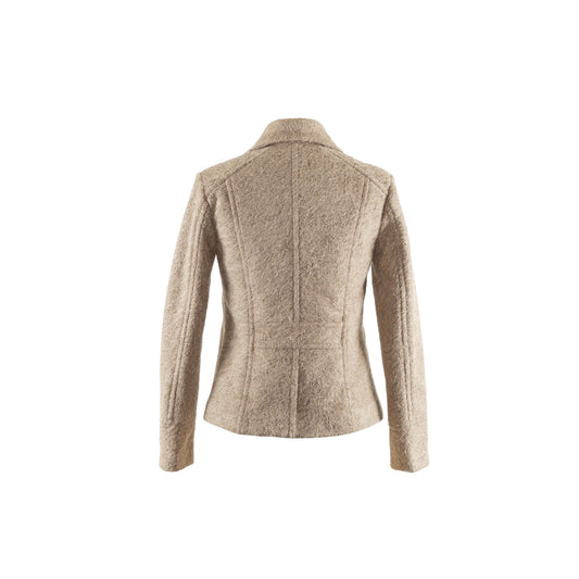 Our model was lying on the ground, while wearing the DOUBLE-BREASTED JACKET and holding the handbag MOSS under her right arm. The double-breasted jacket is designed to fit, featuring our rare find fabric in khaki.   The fabric is mid-to-heavy weighted, keeping you warm and cozy.  This perfect fit jacket sits right above the hip bone.  Best to keep a simple styling, style it with all black or tonal shades.